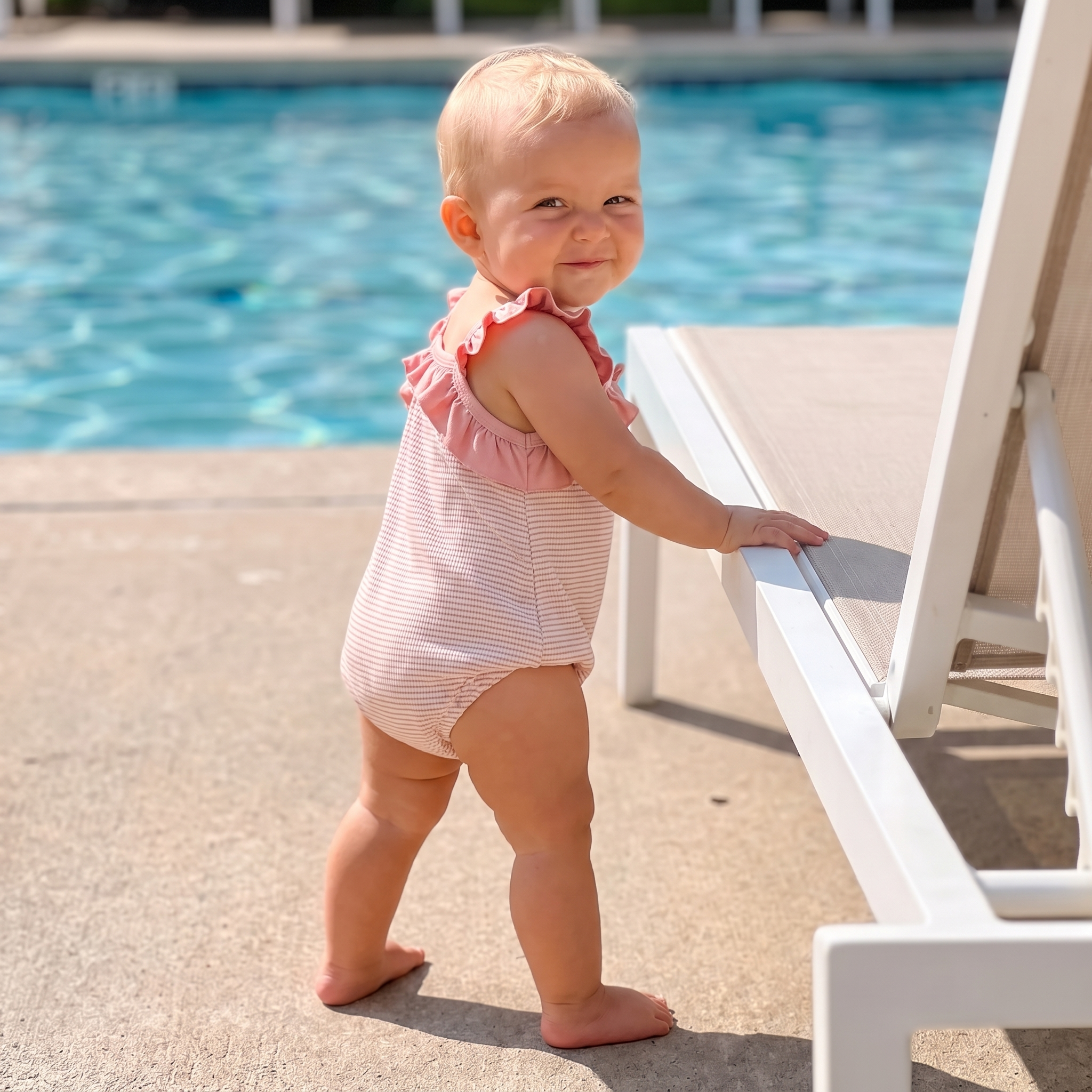 Sleeveless Stripes Ruffle Romper in Pink