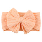 Soft Knit Bow Headband in Carrot