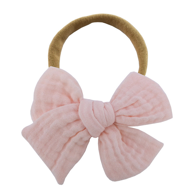 Tiny Bow in Peach
