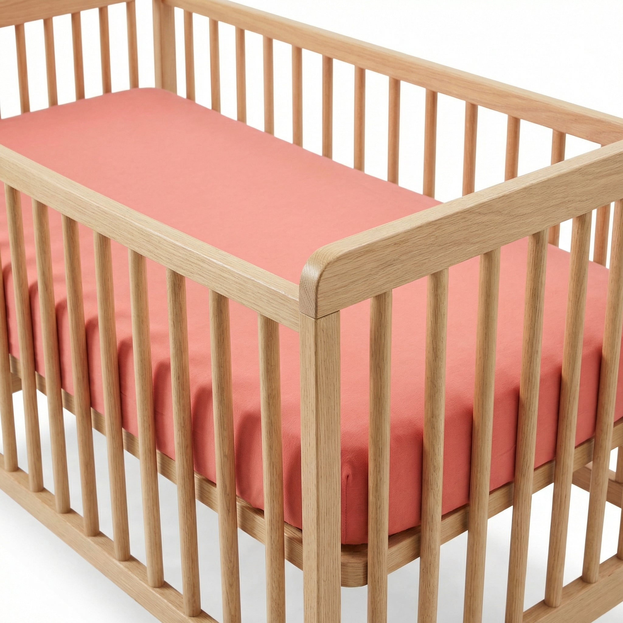 Crib Sheet in Coral Pink