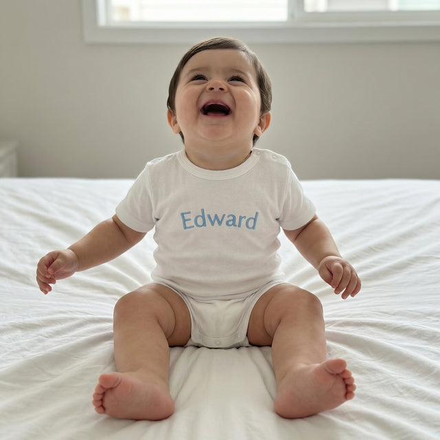 Embroidered Snap Romper in Cloud