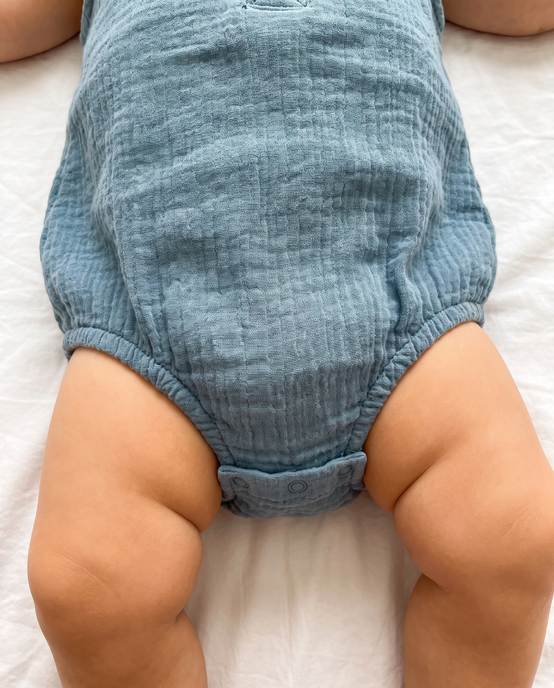 Sleeveless Muslin Bubble Romper in Lake Blue
