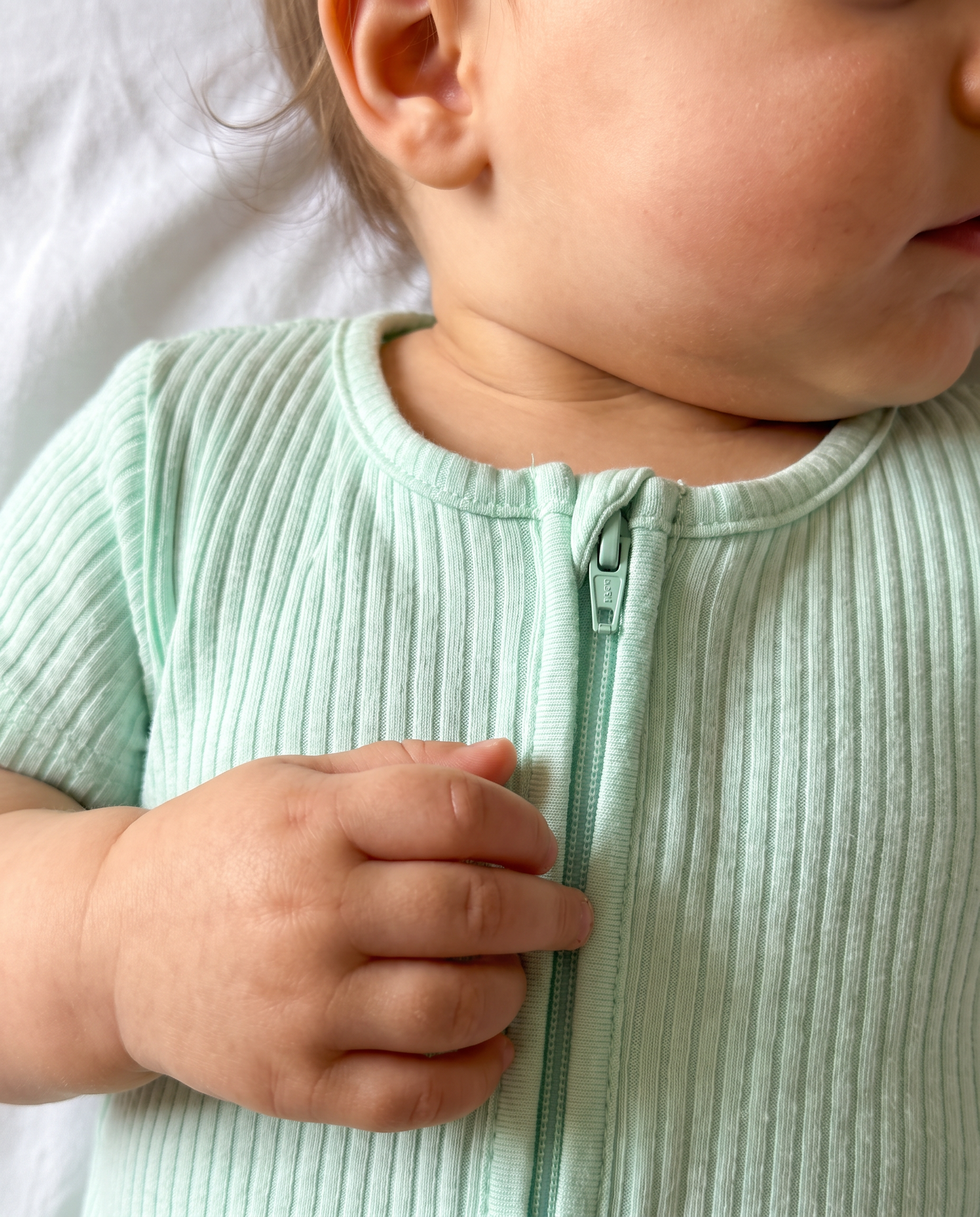 Short-sleeved Ribbed Zip Romper in Light Green