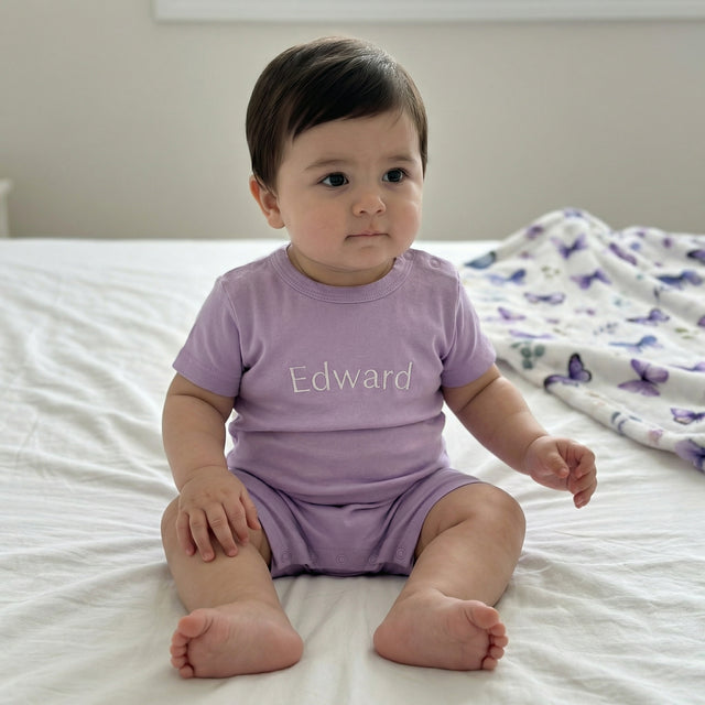 Embroidered Snap Romper in Lilac Mist
