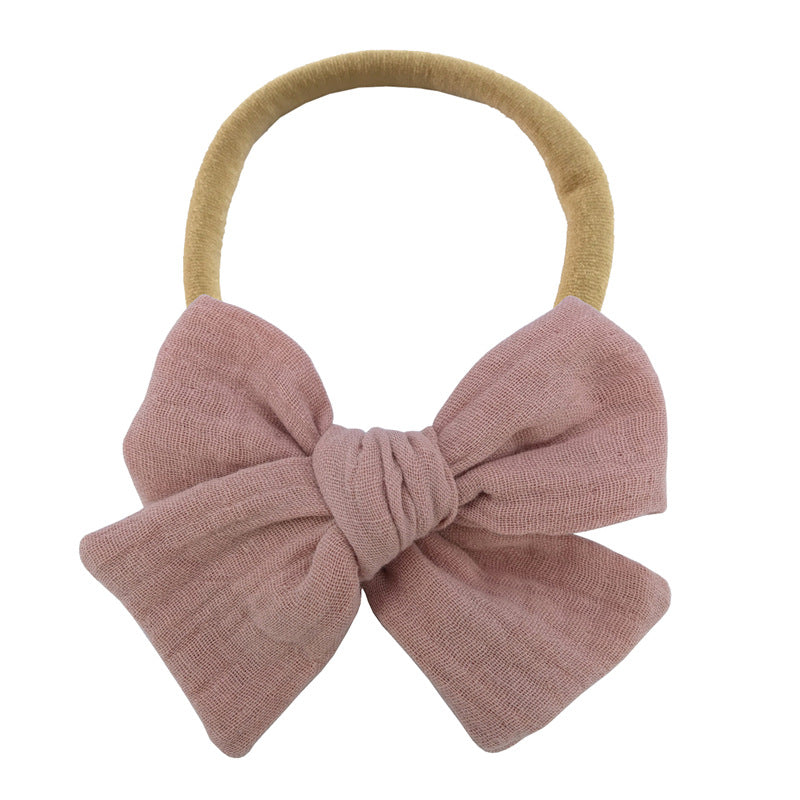 Tiny Bow in Clay