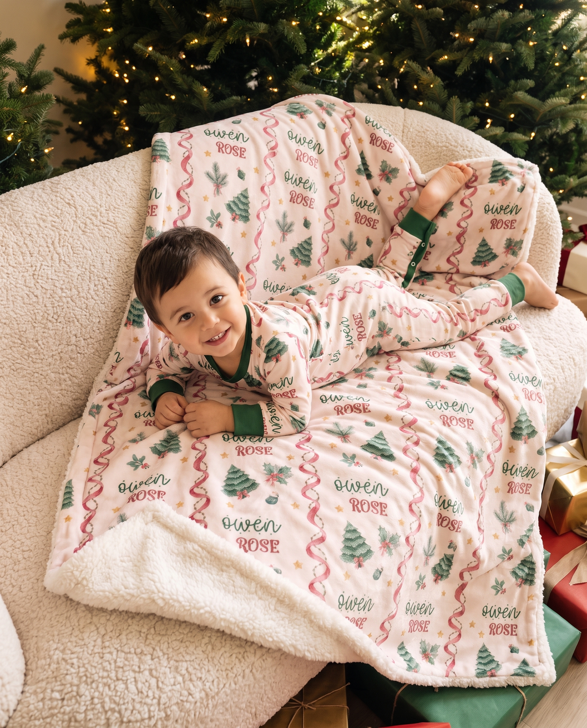 Baby wearing the Sweetly Trimmed long-sleeved snap romper