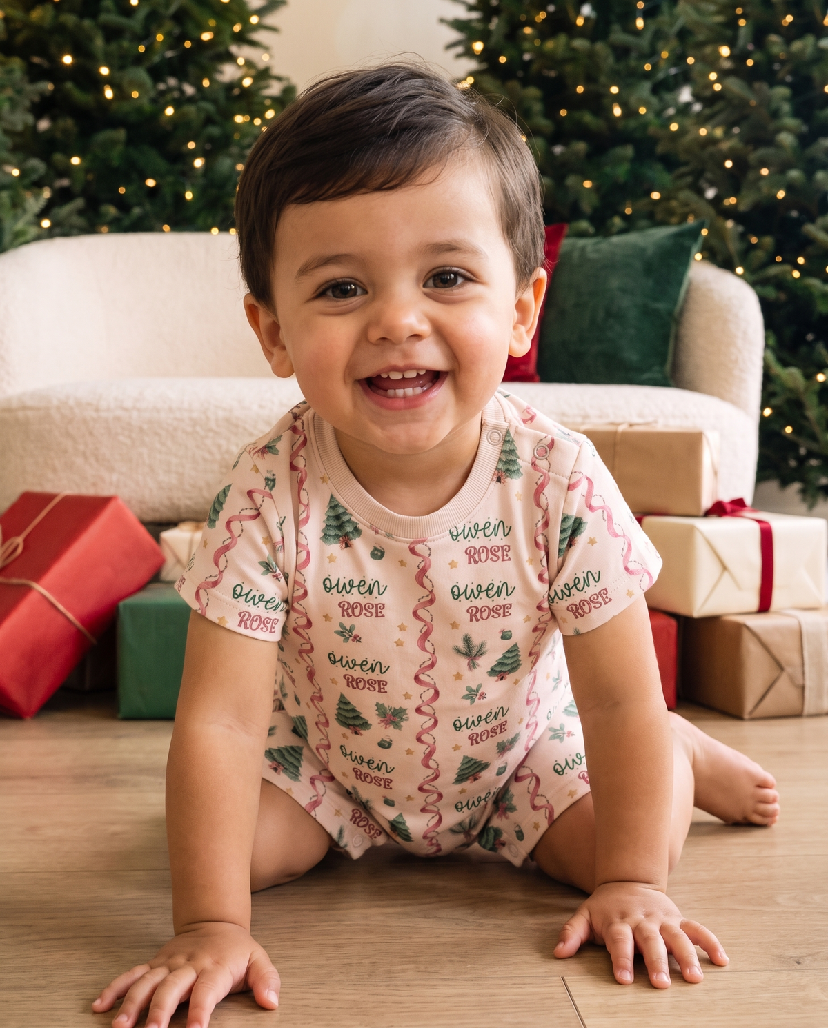 Baby wearing the Sweetly Trimmed snap romper