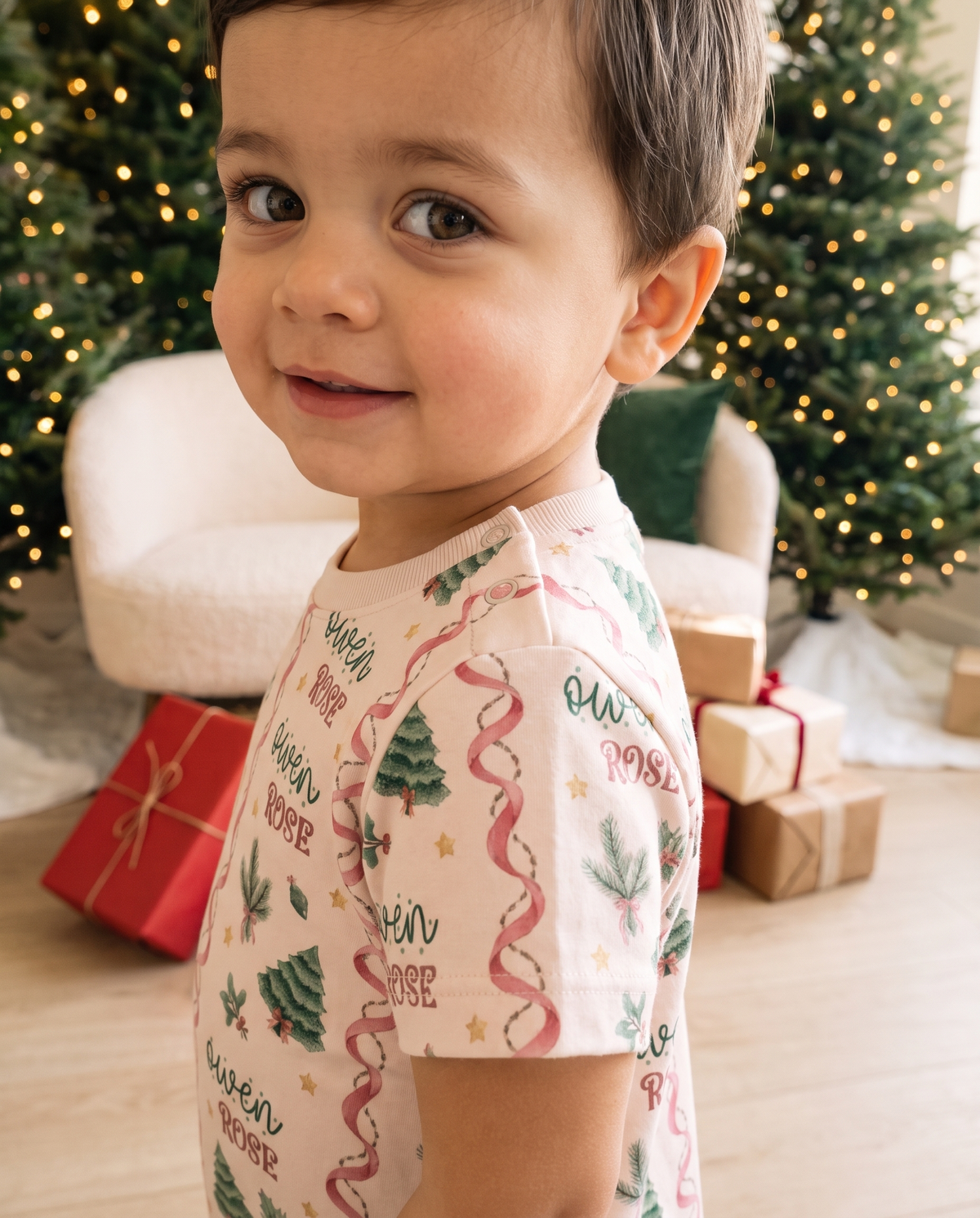 Close-up of the Sweetly Trimmed print on the snap romper